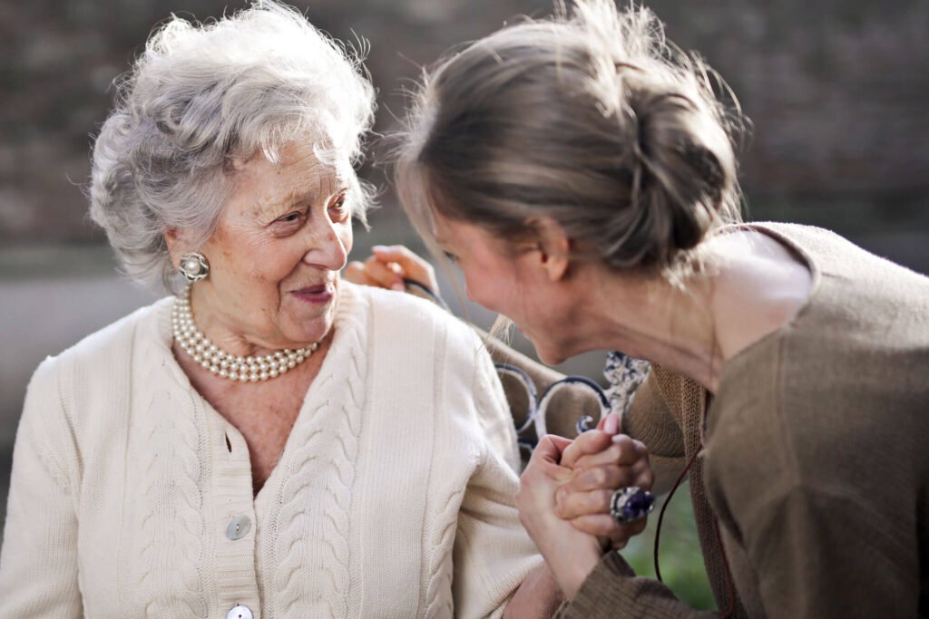 Mother and daughter sharing stories. In motherhood shared stories are carried through generations.